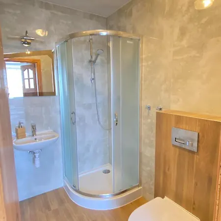 Δωμάτια σε οικογενειακή κατοικία Goscinne R10